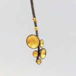 black rhodium gold artisan earrings