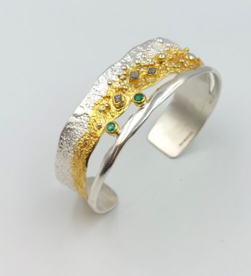 mixed metal-diamond-emerald-bracelet